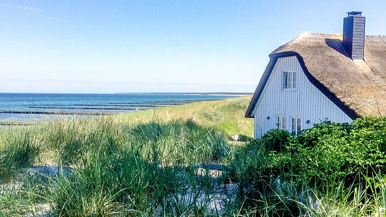 Die Nord- und Ostseeinseln werden für Ferienhäuser immer beliebter Ferienhaus inmitten von Sanddünen vermieten